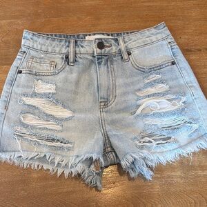 High-Rise Light Blue Ripped Denim Shorts with Frayed Hem